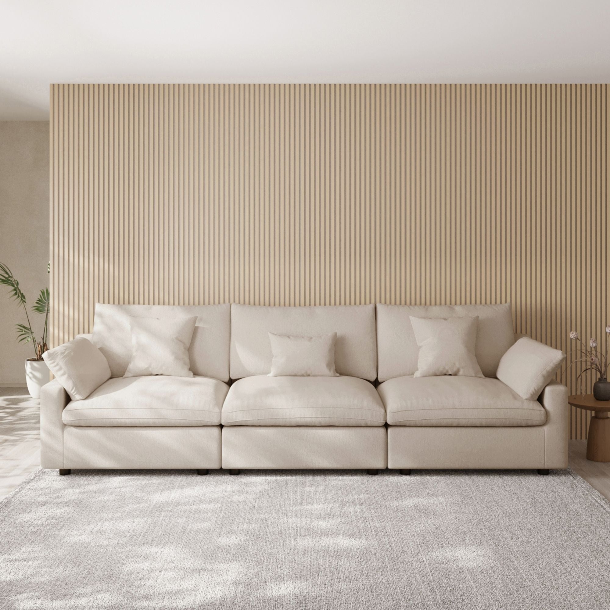 Khaki 3-seater sofa in a room with striped wallpaper