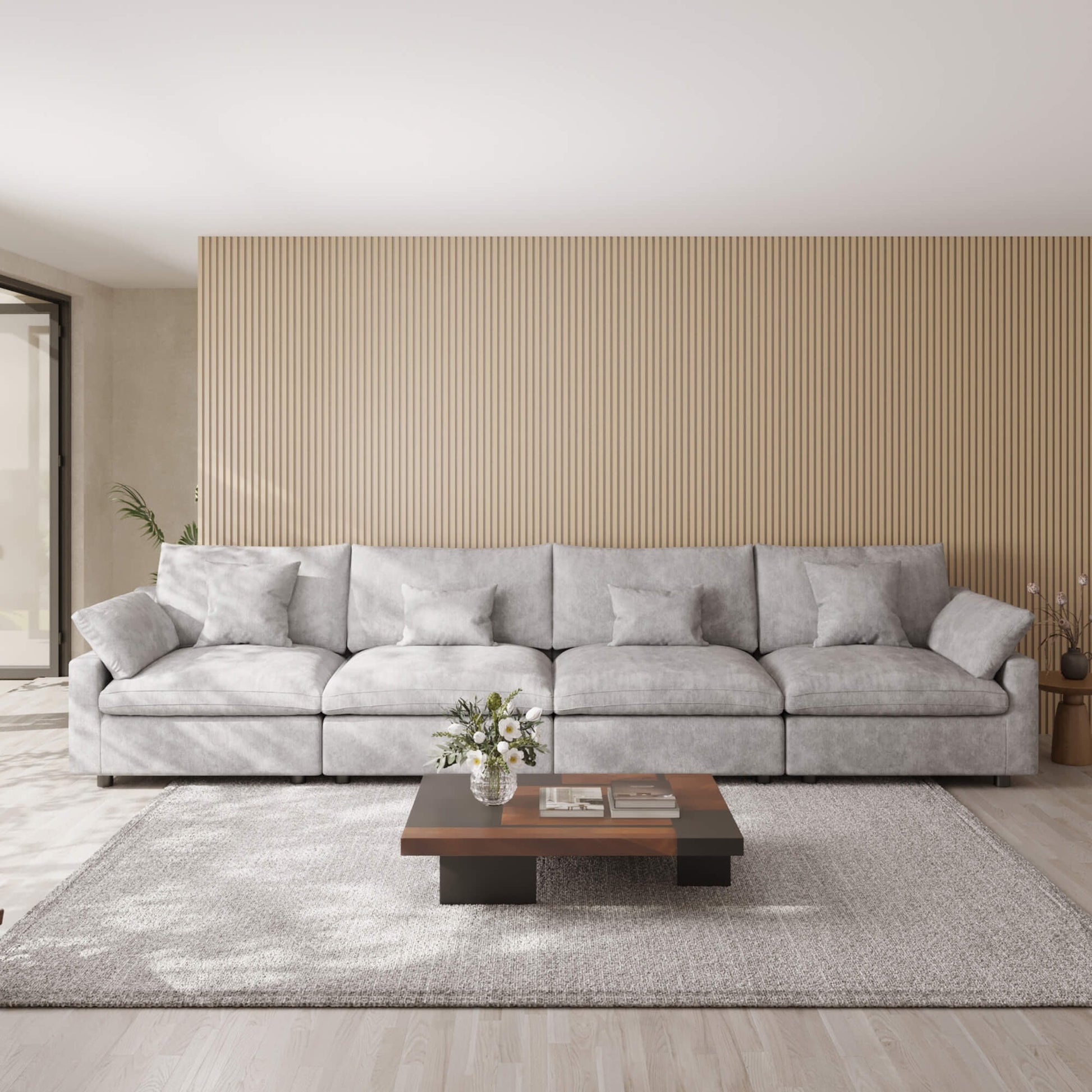 Light gray sectional sofa in a modern living room with a wooden coffee table and decorative elements.