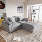 A light gray linen loveseat with ottoman, featuring a washable cloud design, placed on a patterned rug in a room with a record collection on the wall.