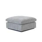 Washable footrest with replaceable covers in gray cotton-linen.