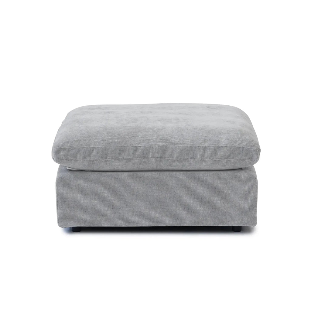 Gray linen-cotton ottoman with washable covers.