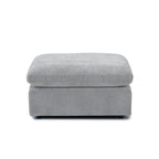 Gray linen-cotton ottoman with washable covers.