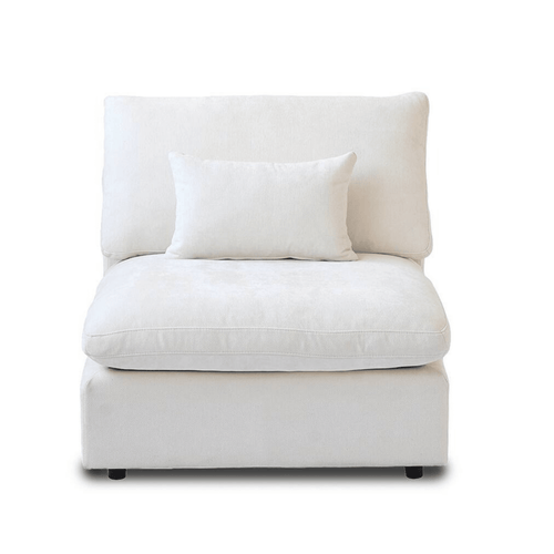 White armless chair with washable covers and accent pillow, front view.