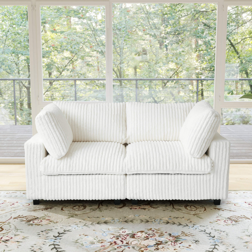 Beige washable 2-seater in faux fur fabric with replaceable covers.