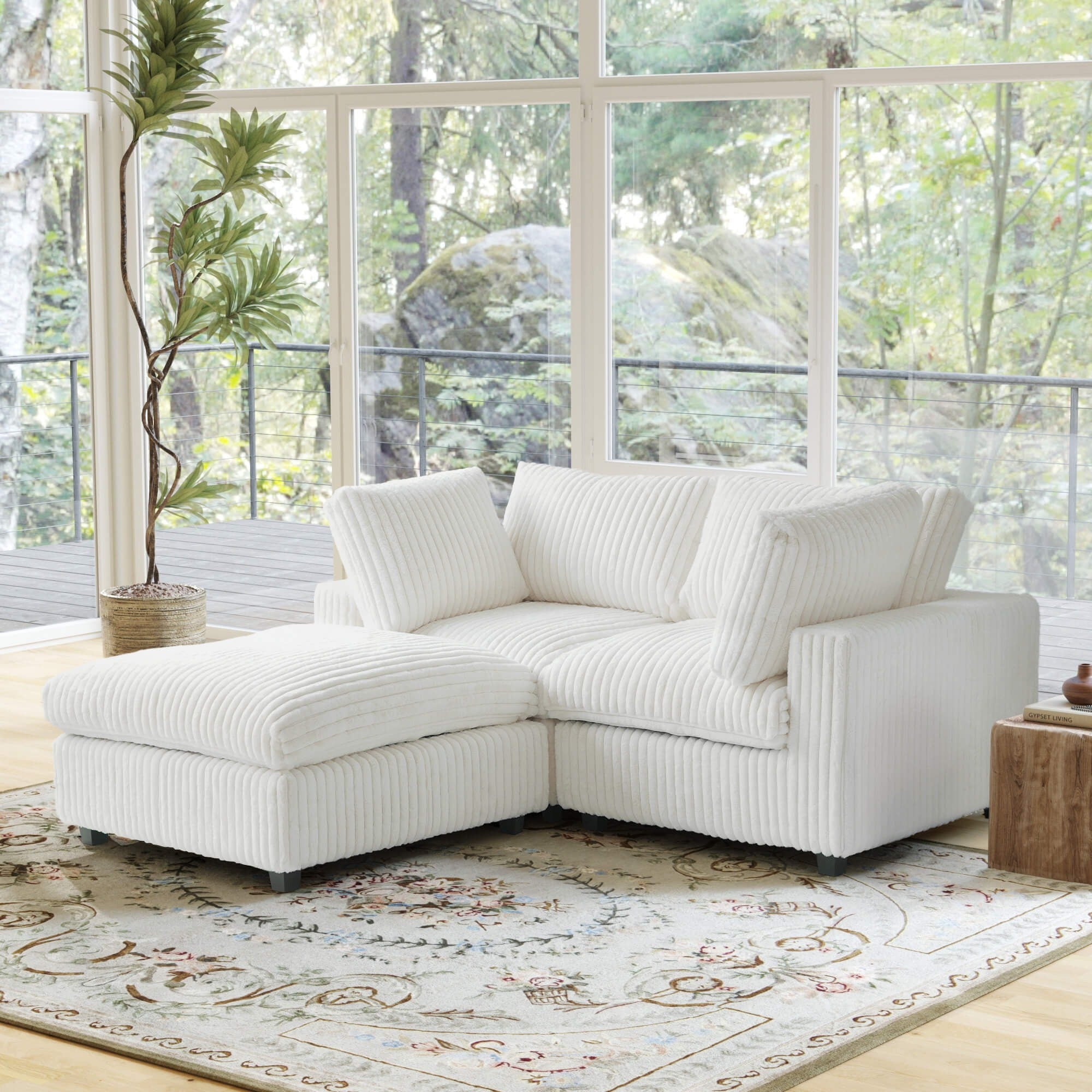 Beige faux fur 2-seater sectional with ottoman and washable covers.
