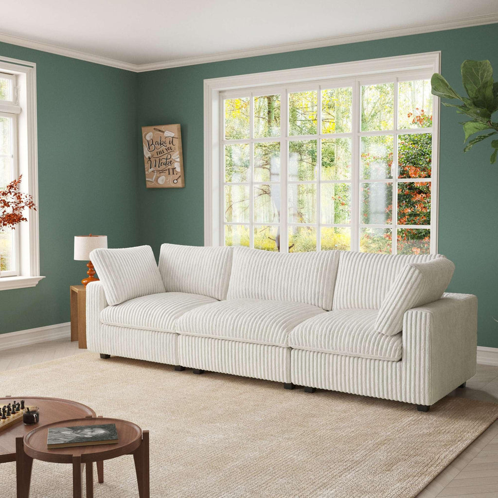 A beige faux rabbit fur sectional sofa with striped patterns, arranged as a 3-seater in a living room setting.