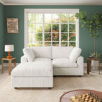 A white faux rabbit fur loveseat and ottoman, placed in a room with green walls, a large window, and a striped pattern.