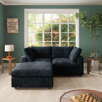 A black faux rabbit fur loveseat and ottoman, placed in a room with green walls, a large window, and a striped pattern.