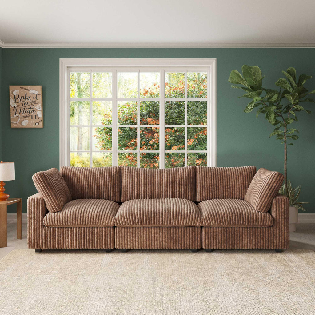 A brown faux rabbit fur sectional sofa with striped patterns, arranged as a 3-seater in a living room setting.