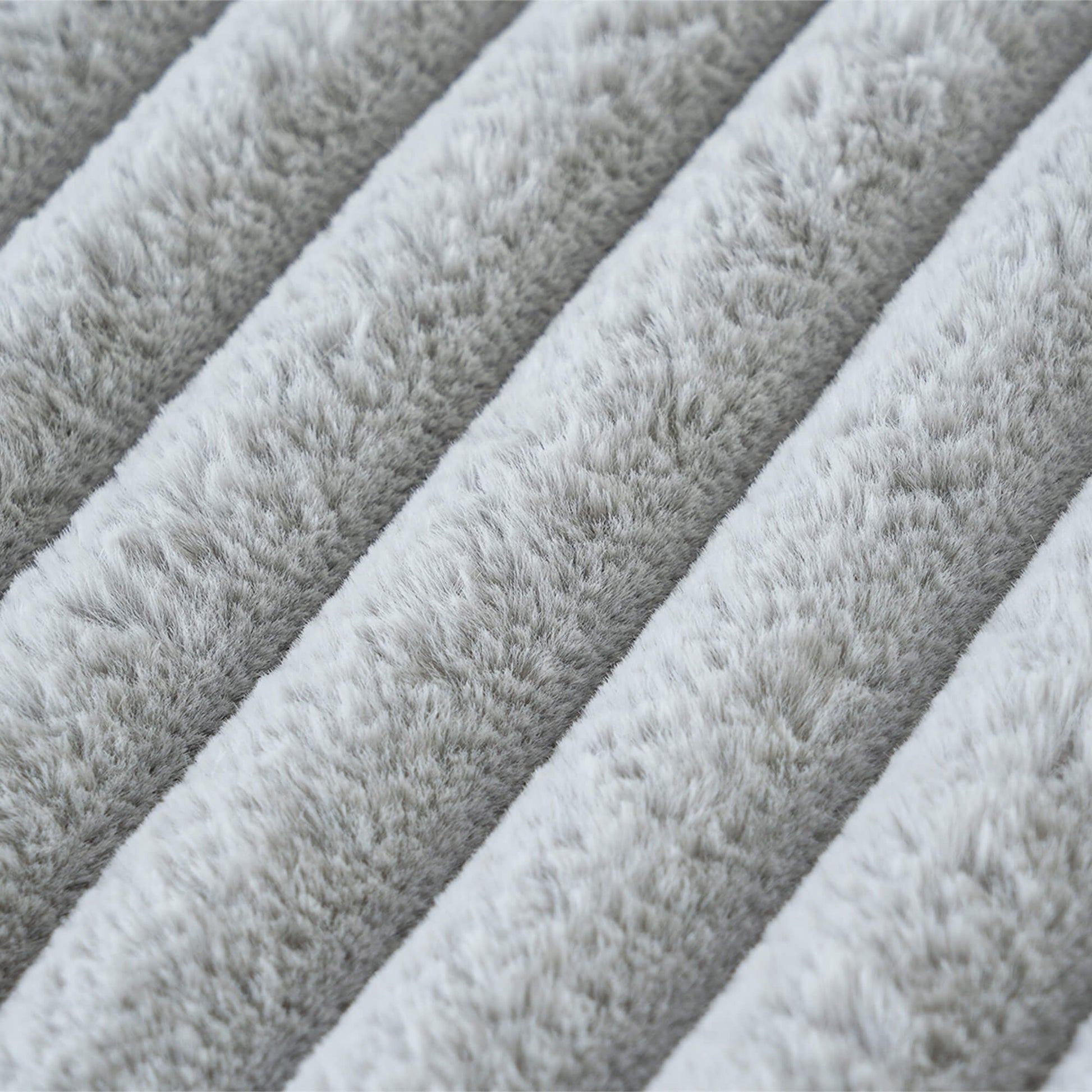 Close-up of gray textured fabric with a ribbed pattern