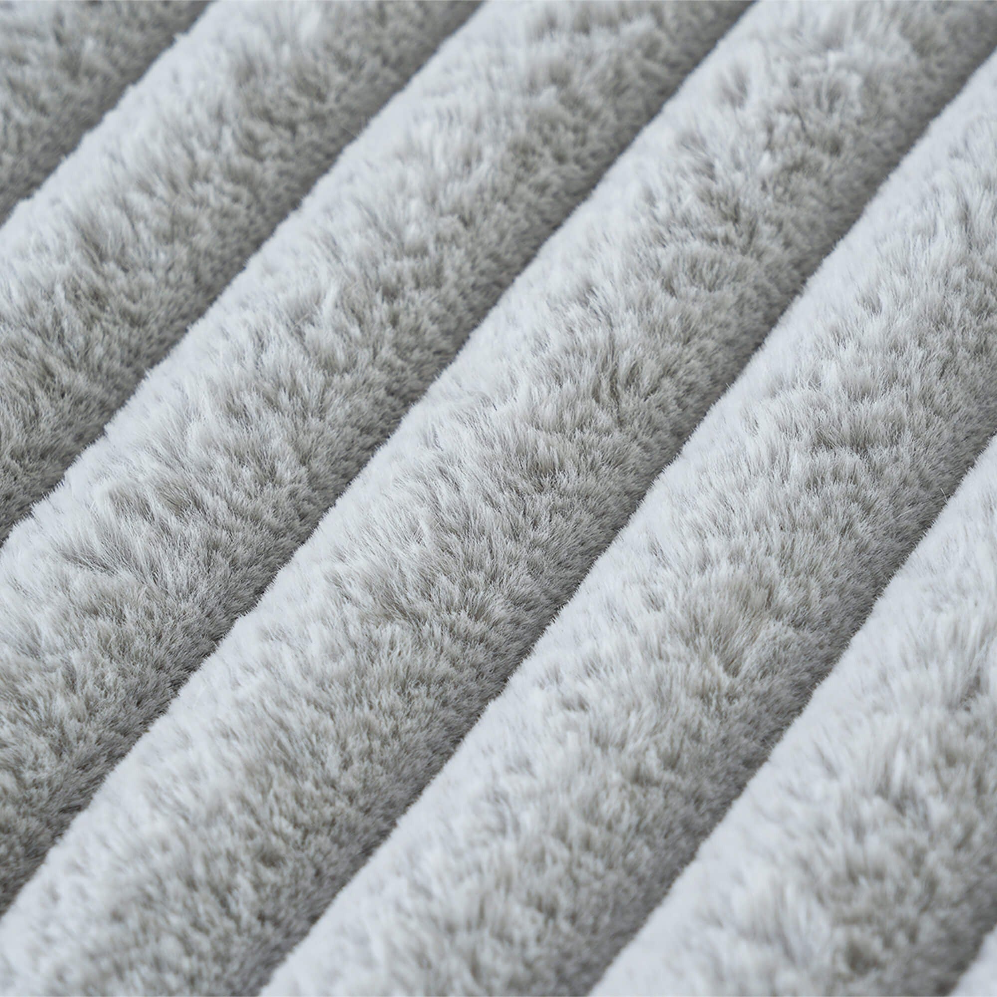 Close-up of gray textured fabric with a ribbed pattern