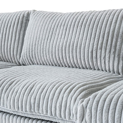 Gray faux rabbit fur sofa with a close-up view of the fabric pattern.