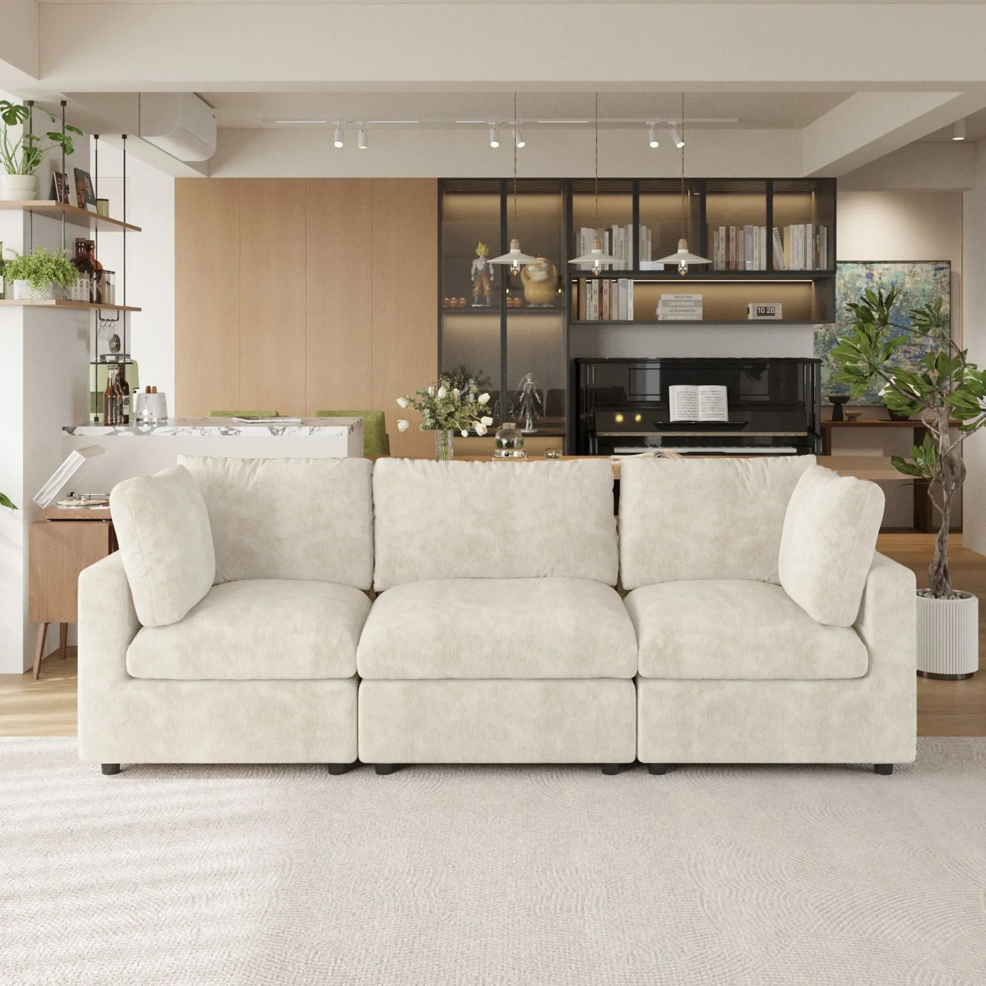 Beige 3-seater sofa in a modern living room with decor elements.