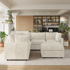 Beige V-shaped corner sectional sofa with ottoman in a living room with decor elements.