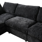 Black sectional sofa on a white background