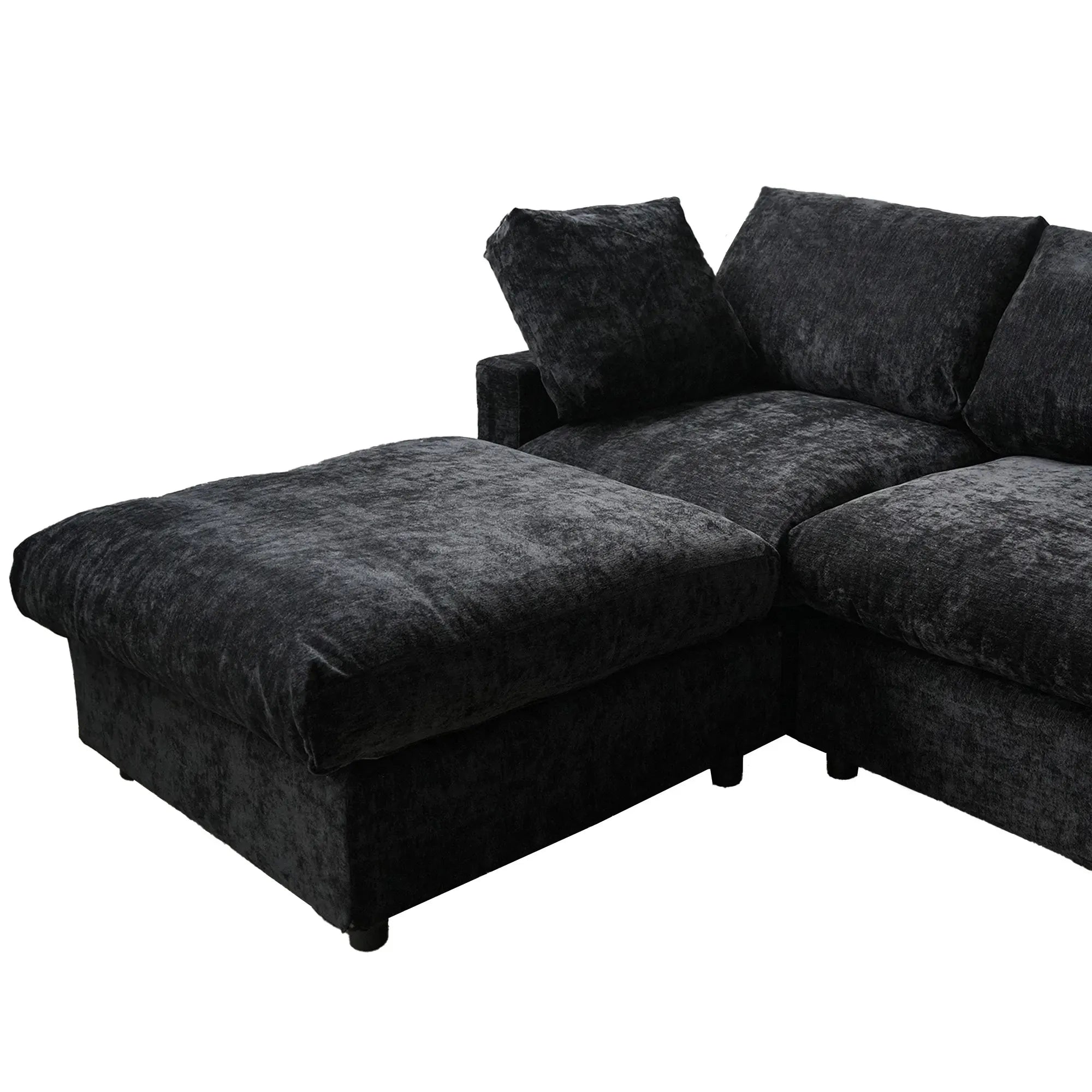 Black sectional sofa on a white background
