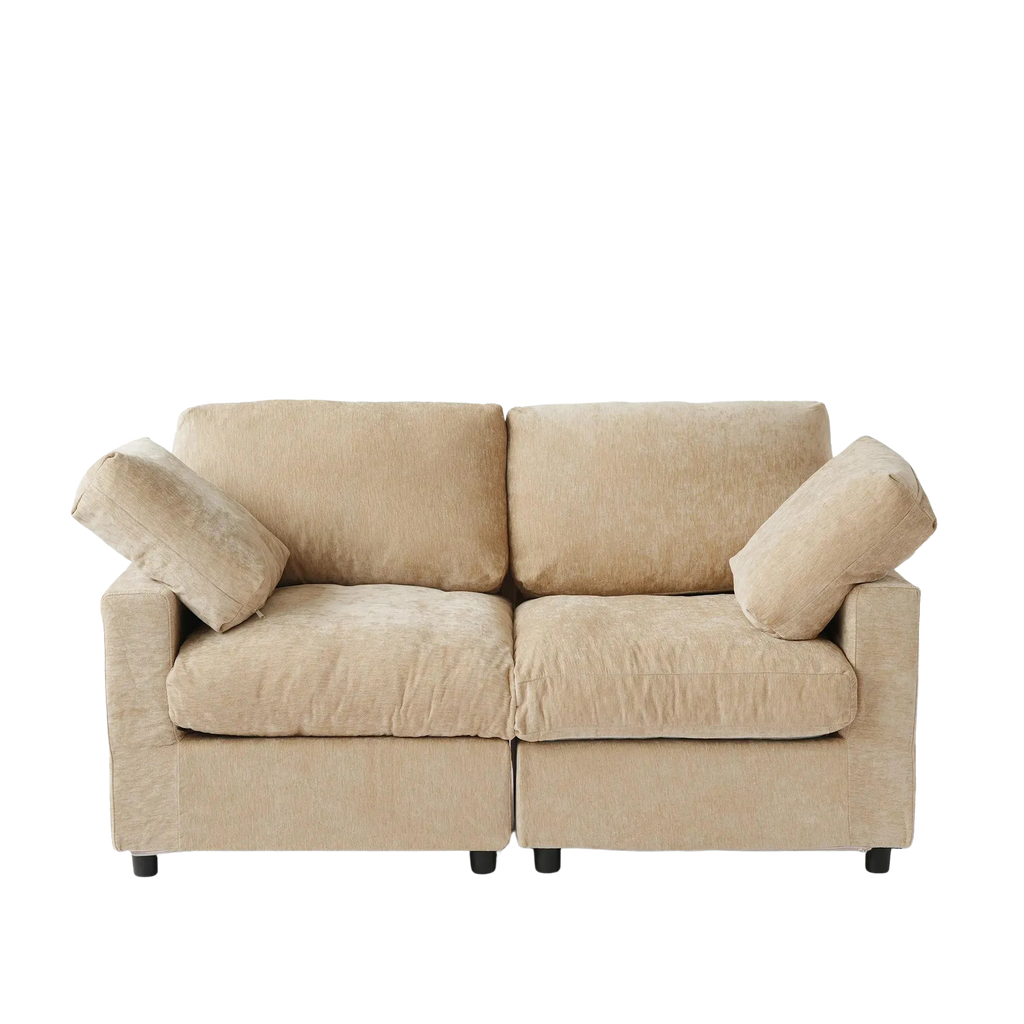 Beige sofa with two cushions on a white background