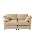 Beige sofa with two cushions on a white background