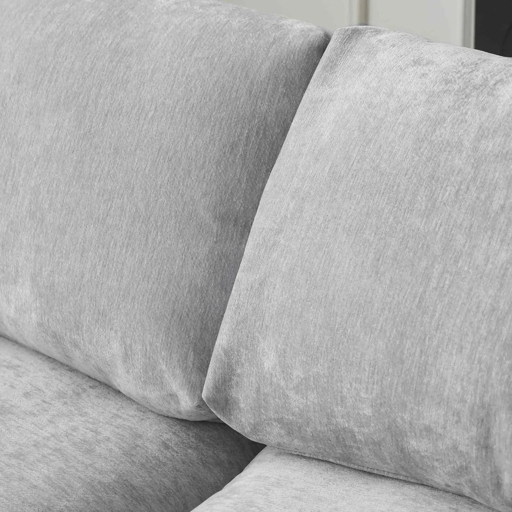 Gray fabric sofa with a focus on texture and color.