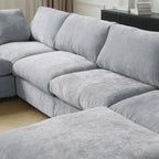 Gray sectional sofa in a living room setting