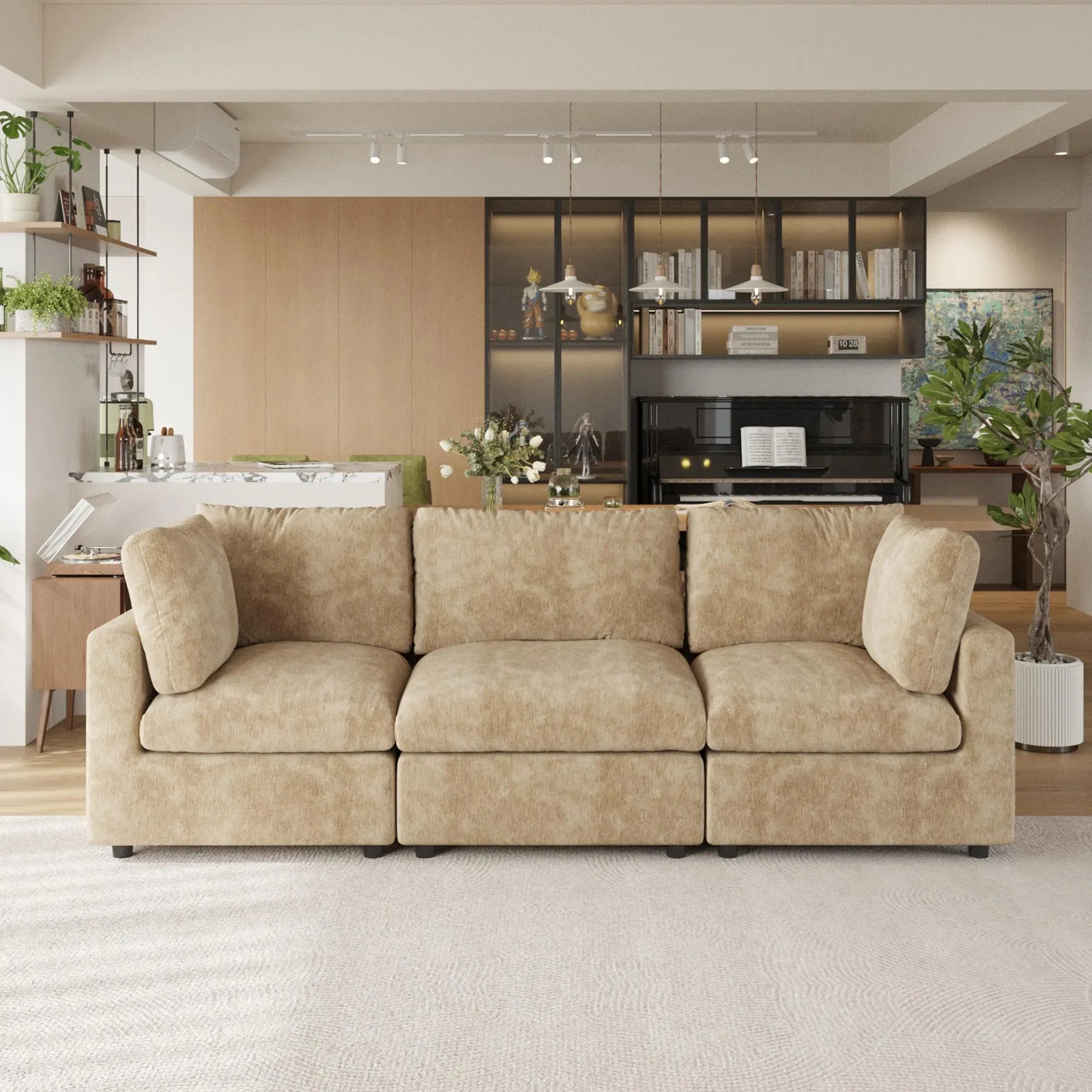 Khaki 3-seater sofa in a modern living room with decor elements.