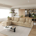 Khaki L-shaped 5-seater sectional sofa in a modern living room with coffee table and decor.