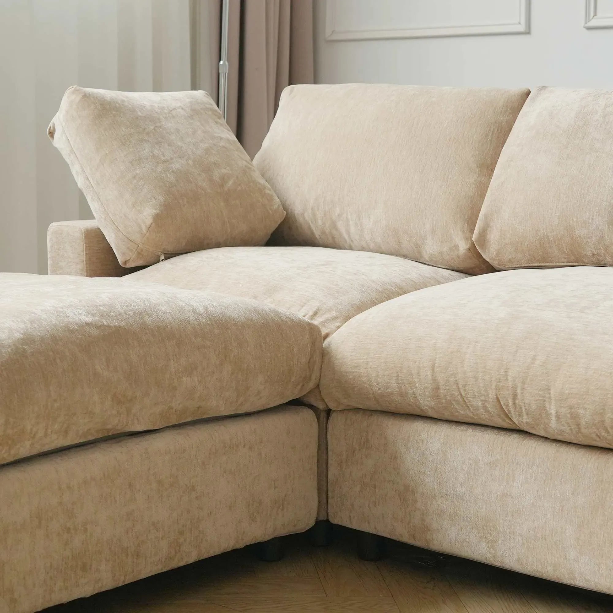 Khaki sectional sofa in a living room setting