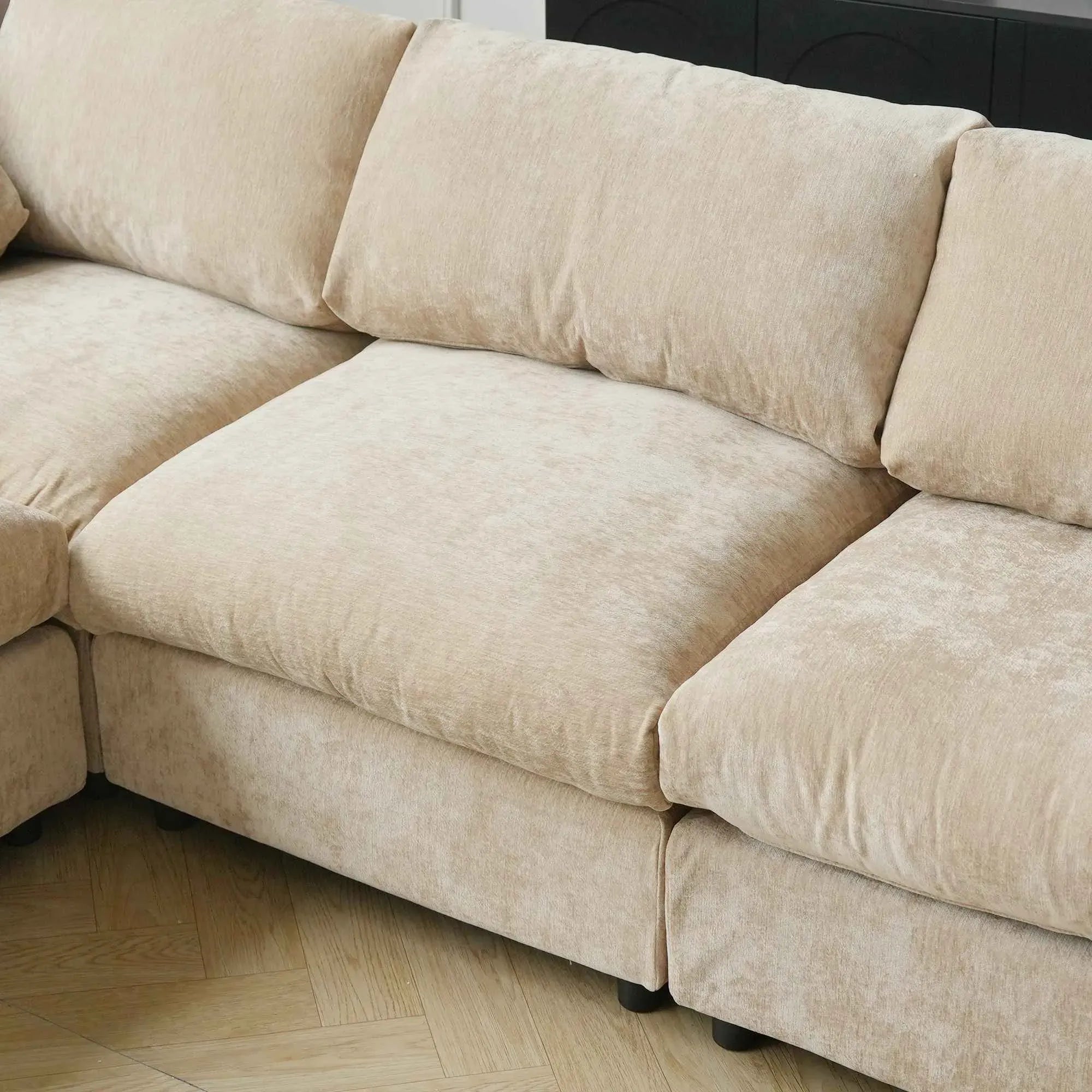 Khaki sectional sofa on a wooden floor